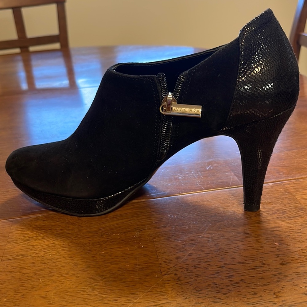 Barely worn ankle booties. Platform front & very comfy. Heel is 3 inches